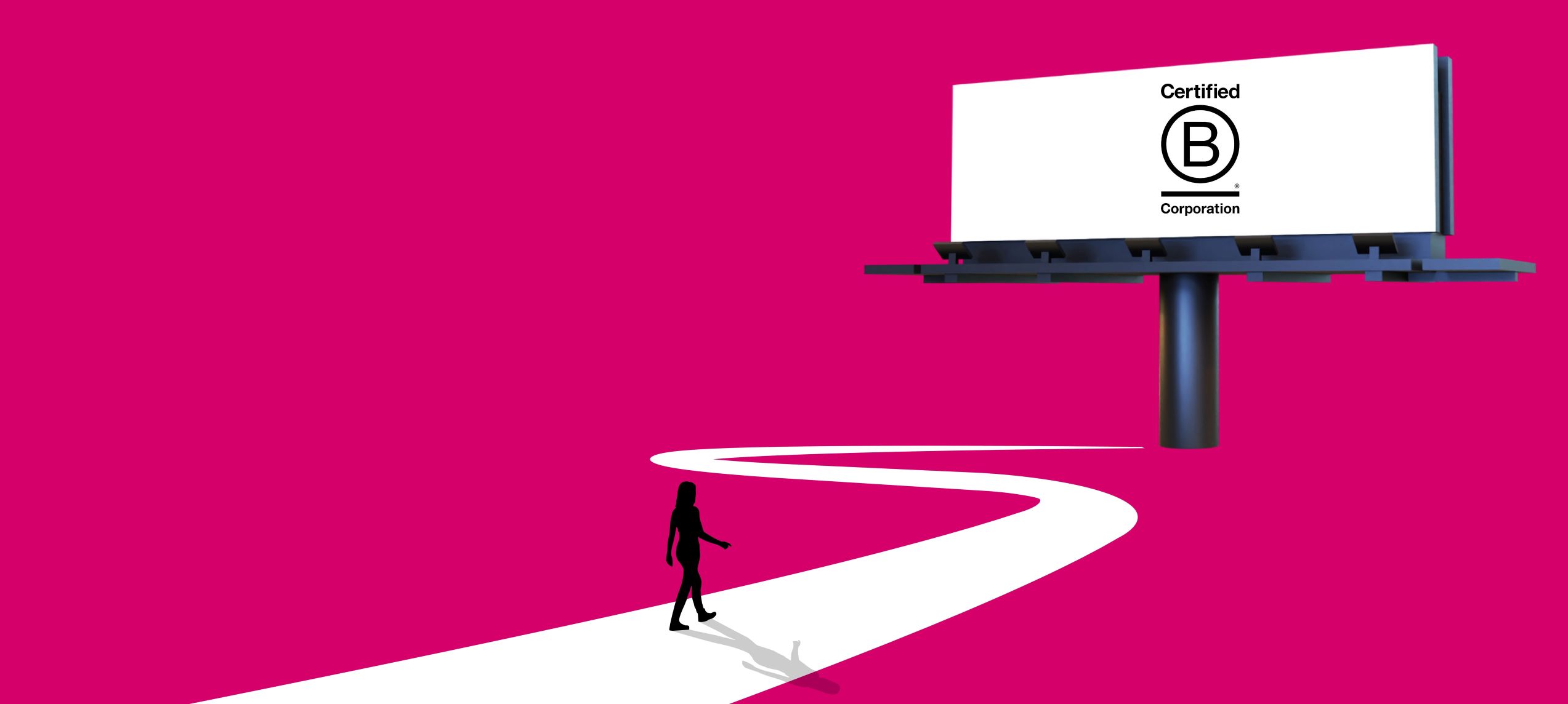 Person walking towards a billboard with B Corp certification