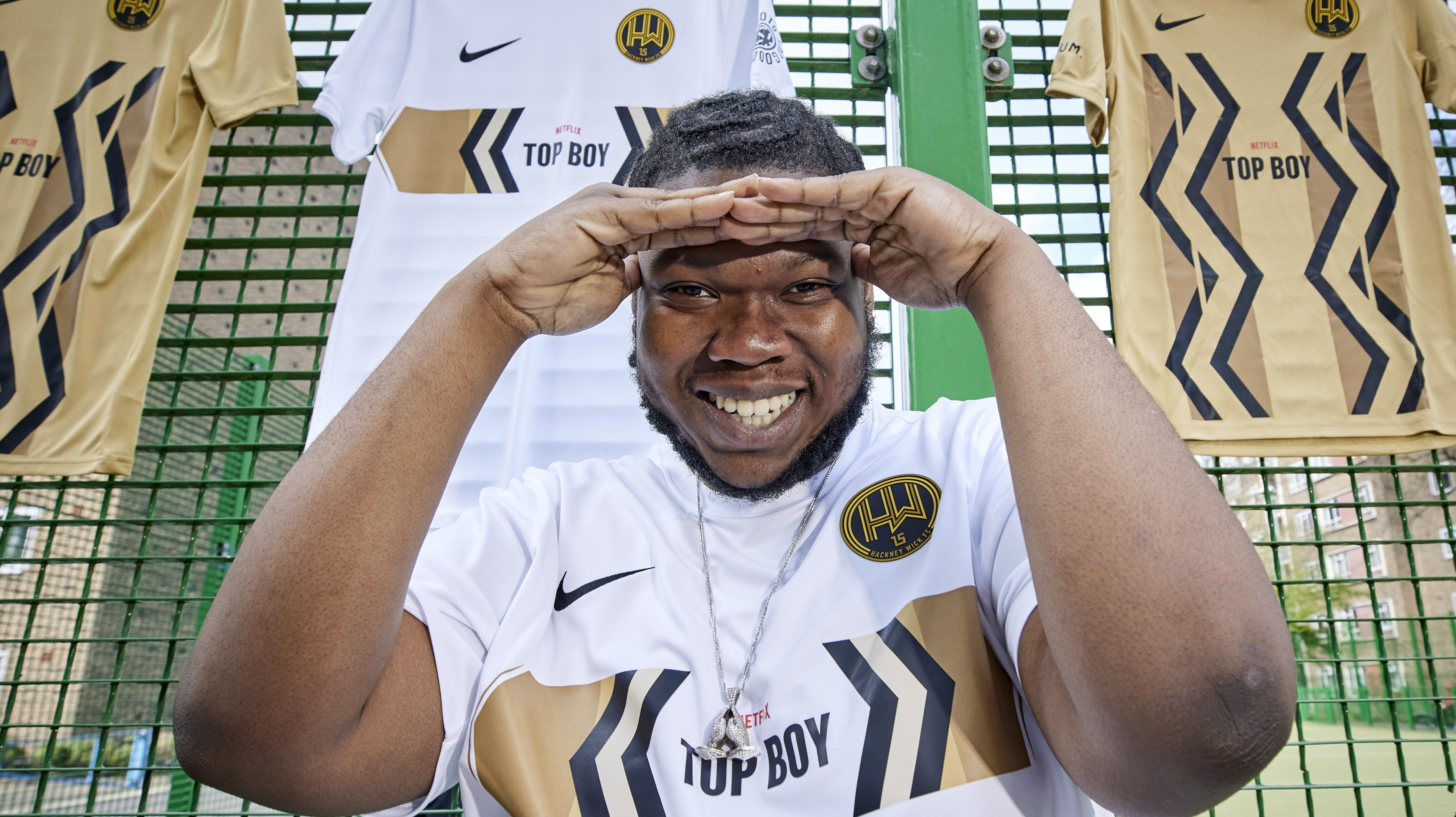 Man wearing Hackney Wick FC football kit