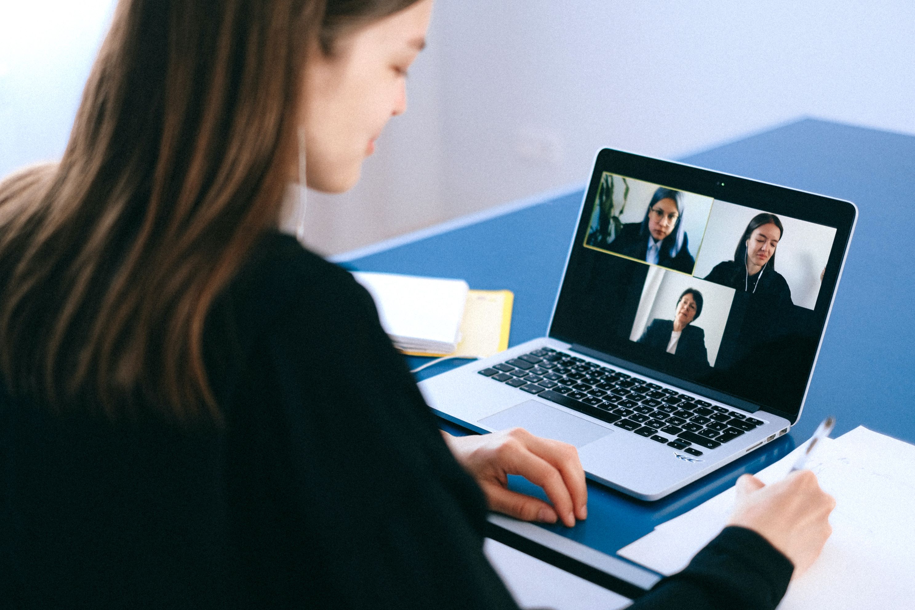 Woman on a virtual conference at her laptop